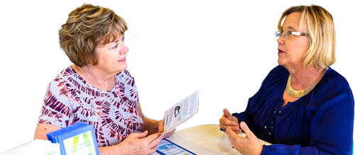 Women discussing information pamphlet